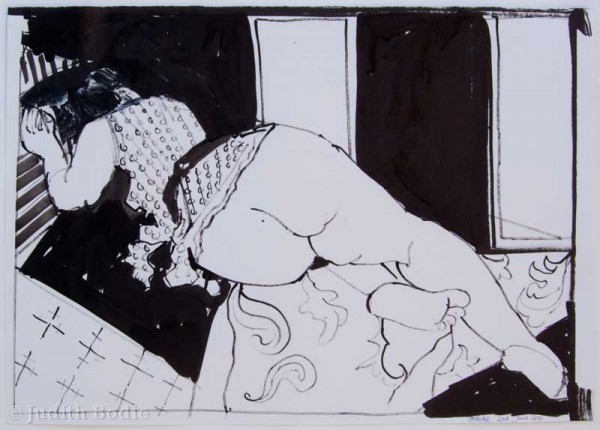 Female reclining on patterned cloth